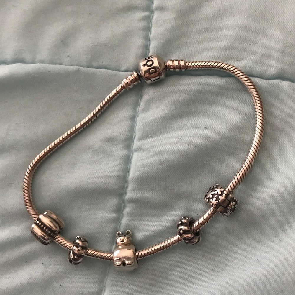 Authentic Pandora bracelet with a few charms